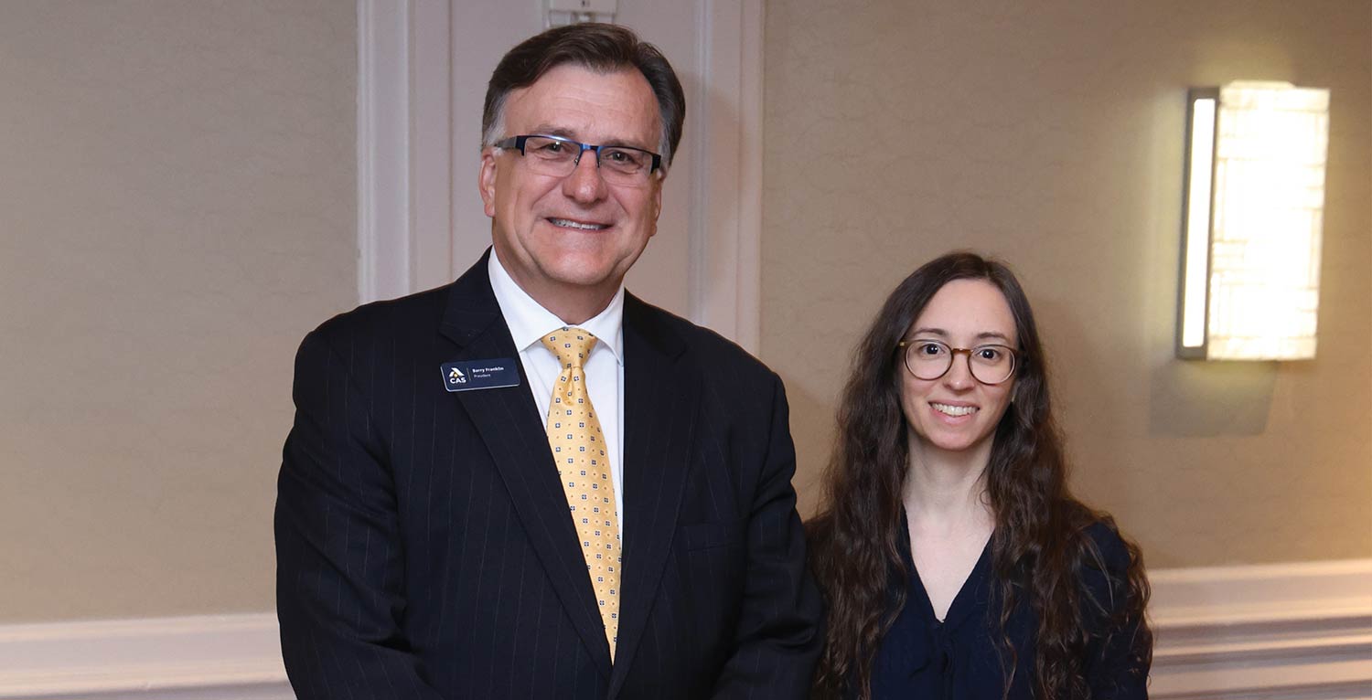 CAS President Barry Franklin posing next to a newly credentialed associate.