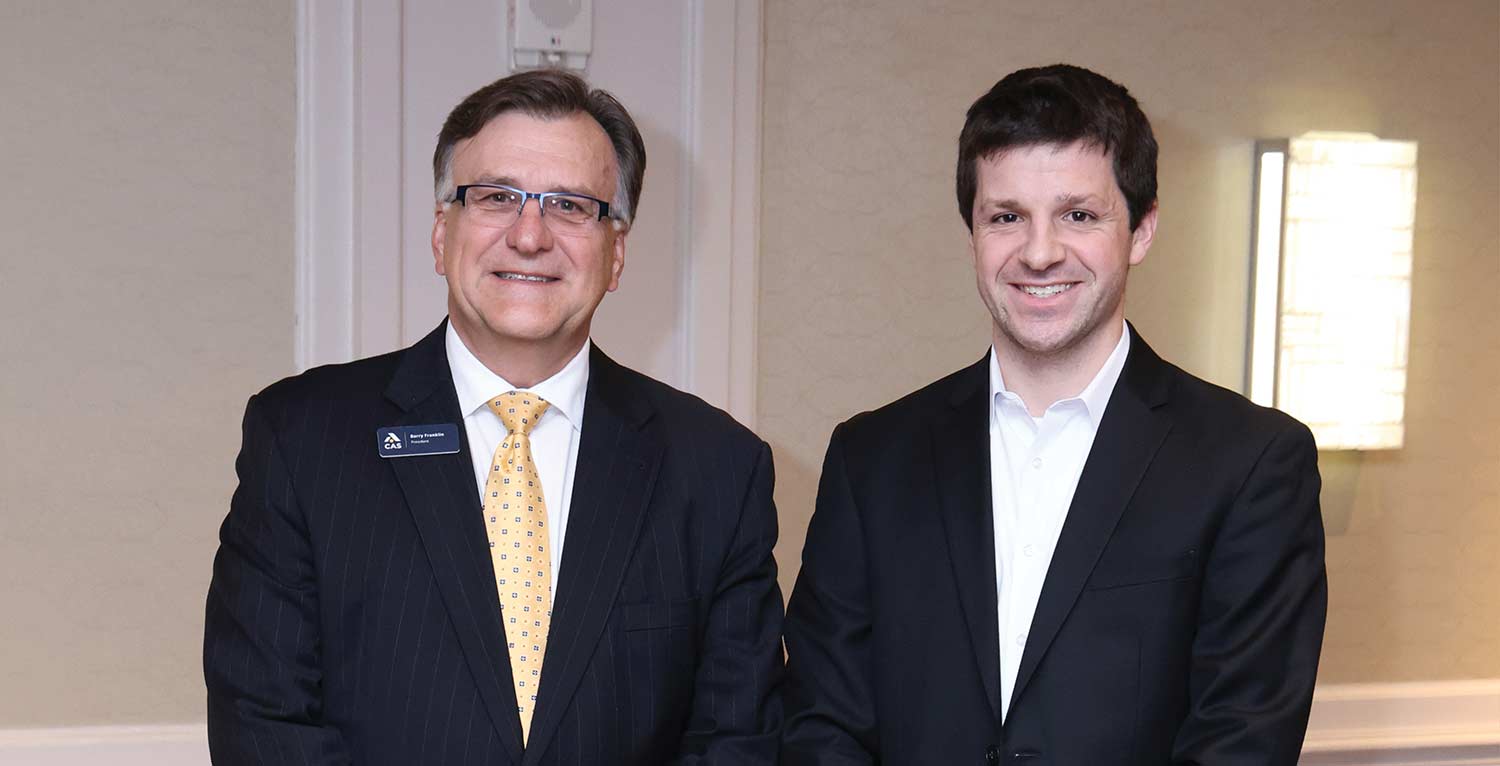 CAS President Barry Franklin posing side-by-side with a newly credentialed fellow.